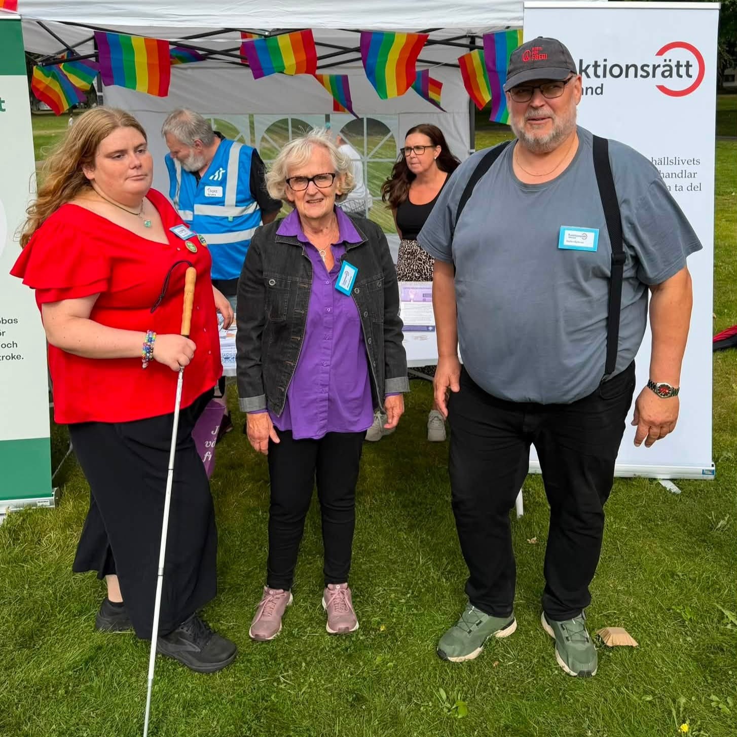 Tre personer står framför ett tält på Wermland Pride